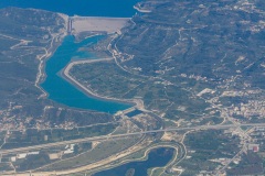 Dam at Pournariou reservoir with town of Arta