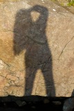 Carolyn's shadow on rocks near Ardnamurchan Lighthouse