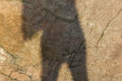 Carolyn's shadow on rocks near Ardnamurchan Lighthouse