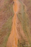 Colourful patterns in the red earth streams